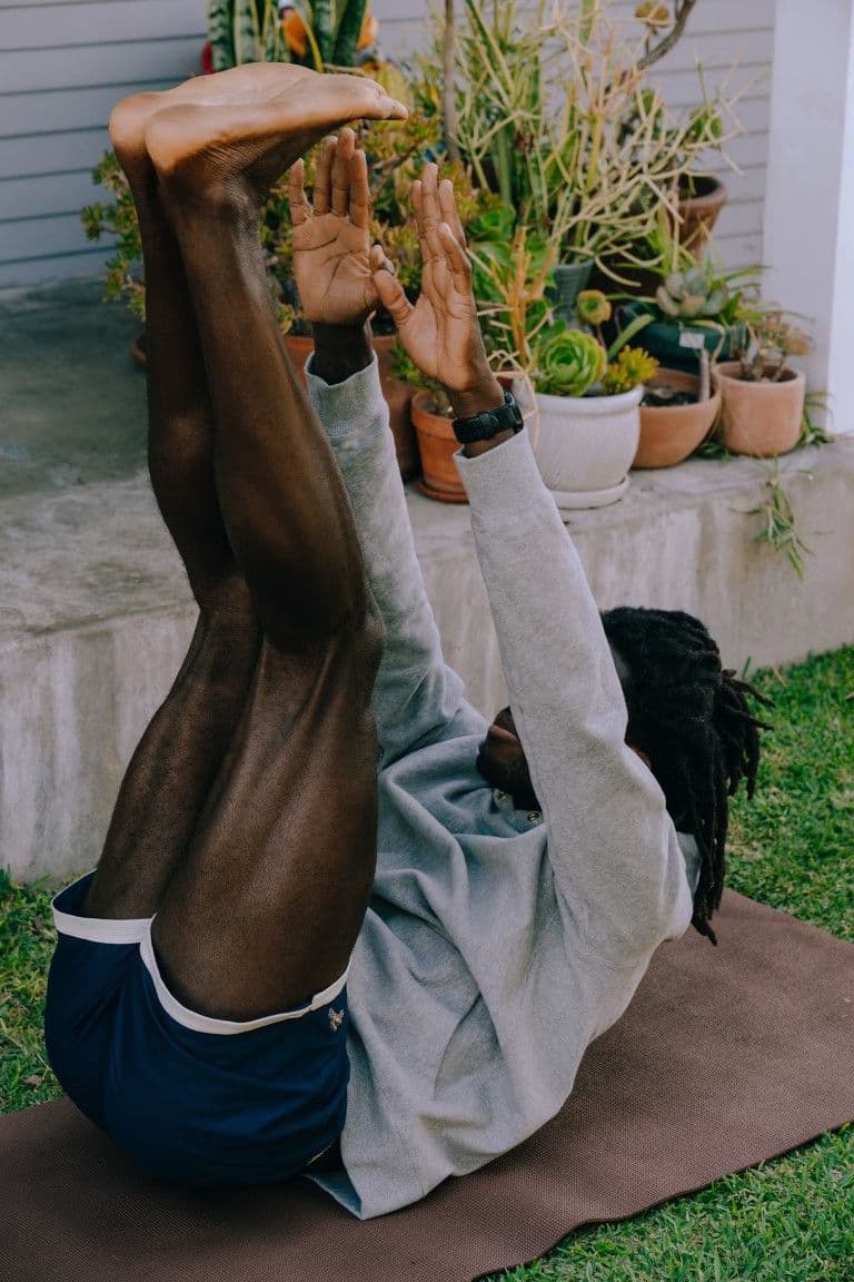 Garden yoga in a sunlit Porto courtyard