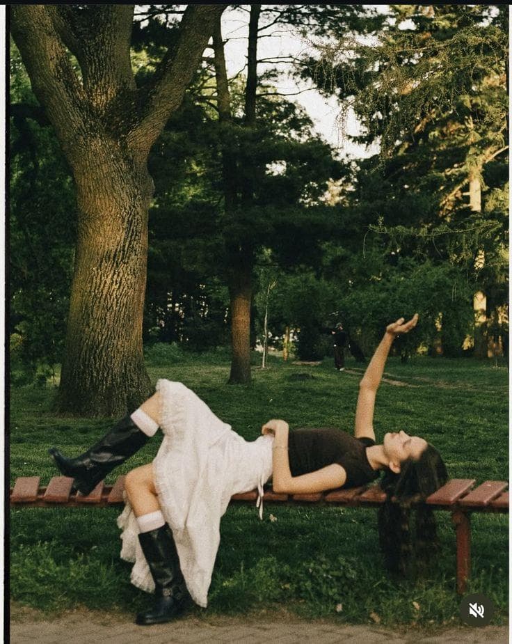 A dancer moving outdoors in a Porto park