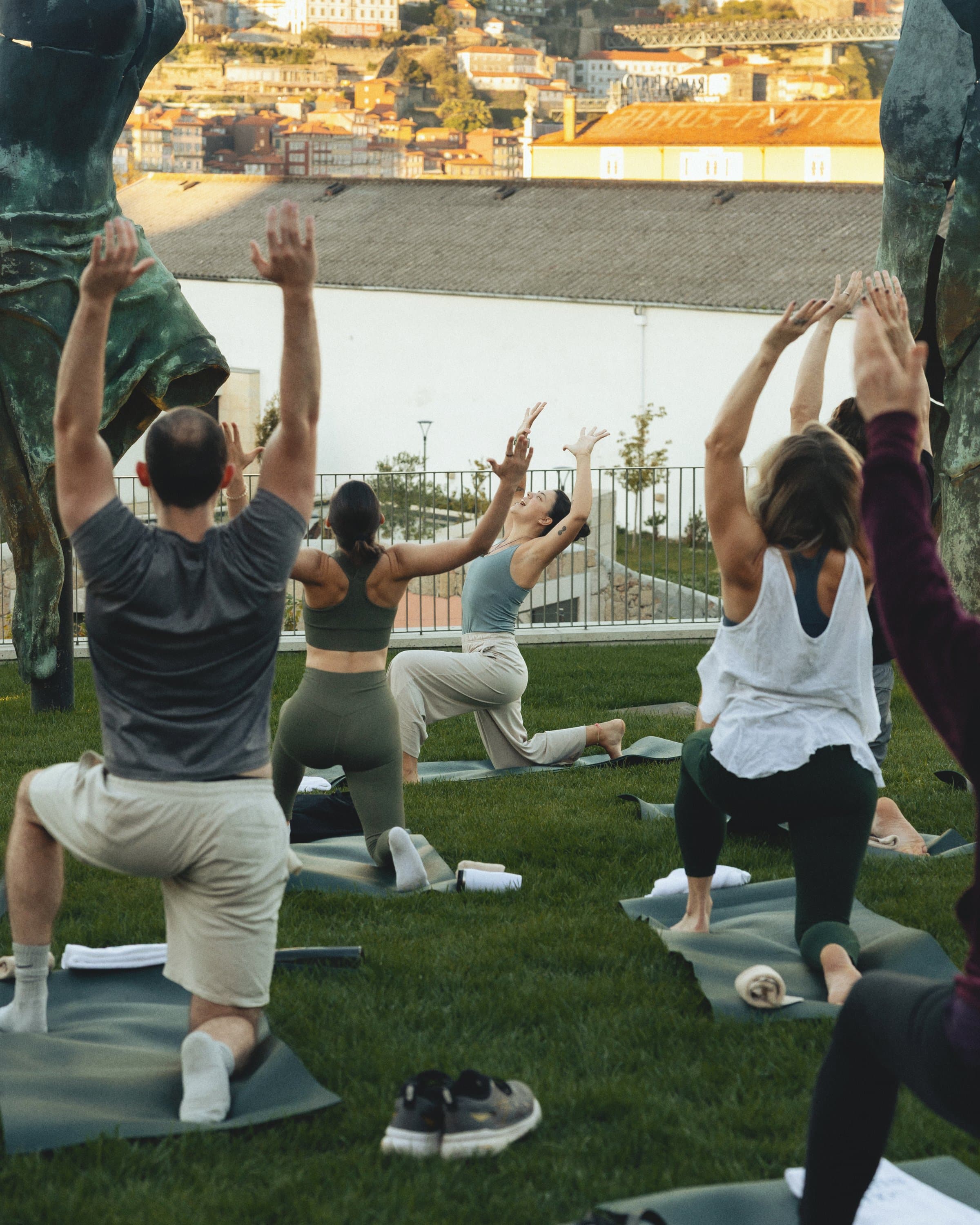 Sunset yoga on the lawn, with Porto across the river.